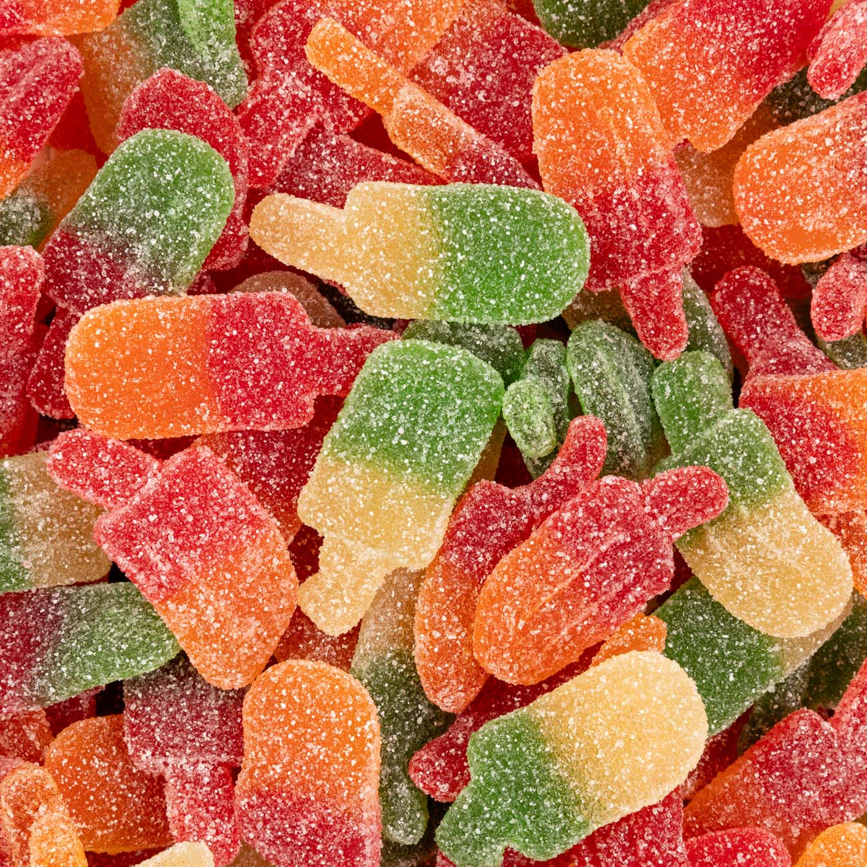 Colorful gummy bears in red, green, and orange